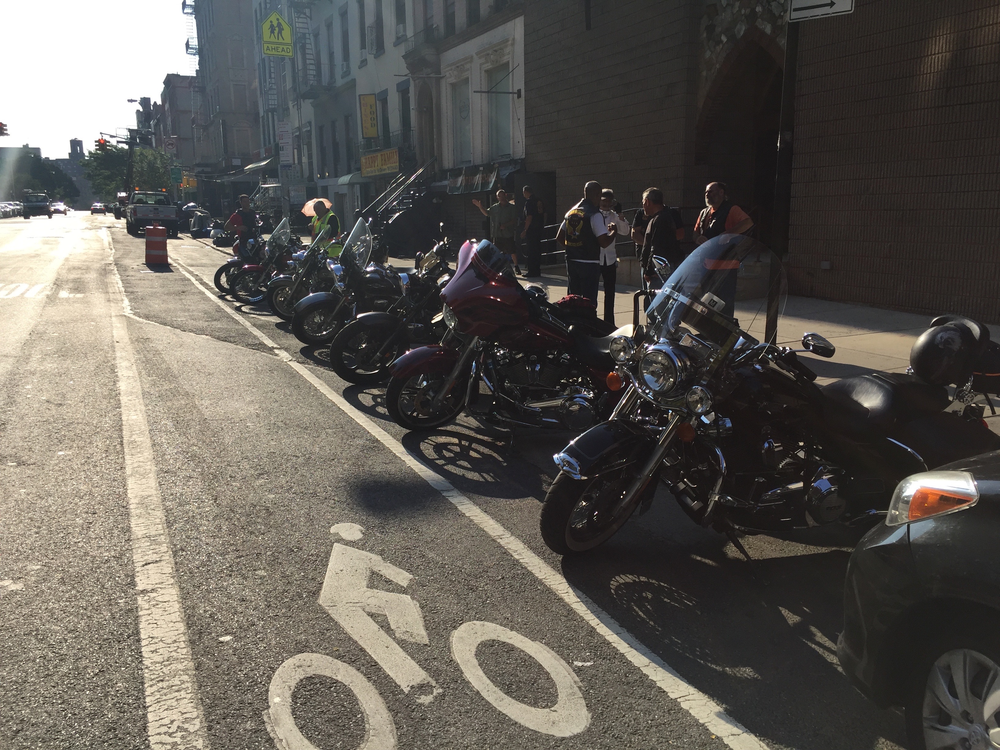 Motorcycles parked in a row on a New York City street